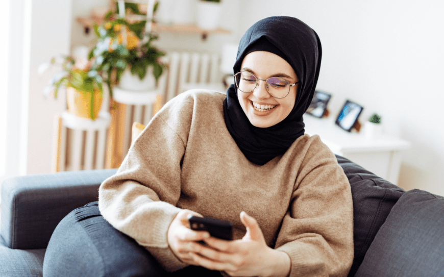 Dental benefits user interacting with phone