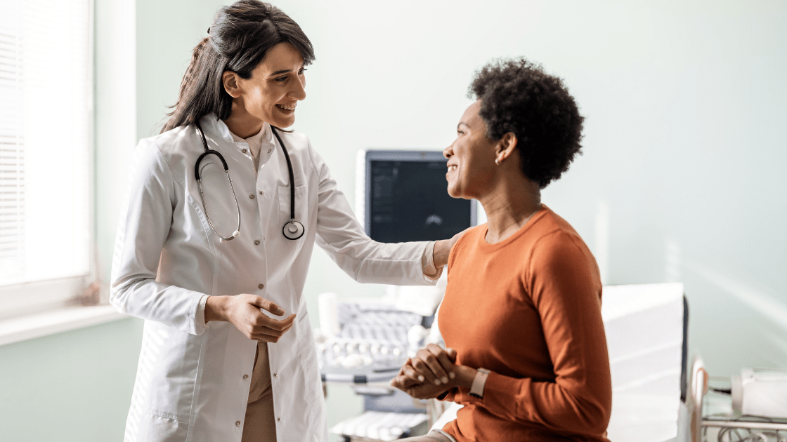 Doctor looking at patient