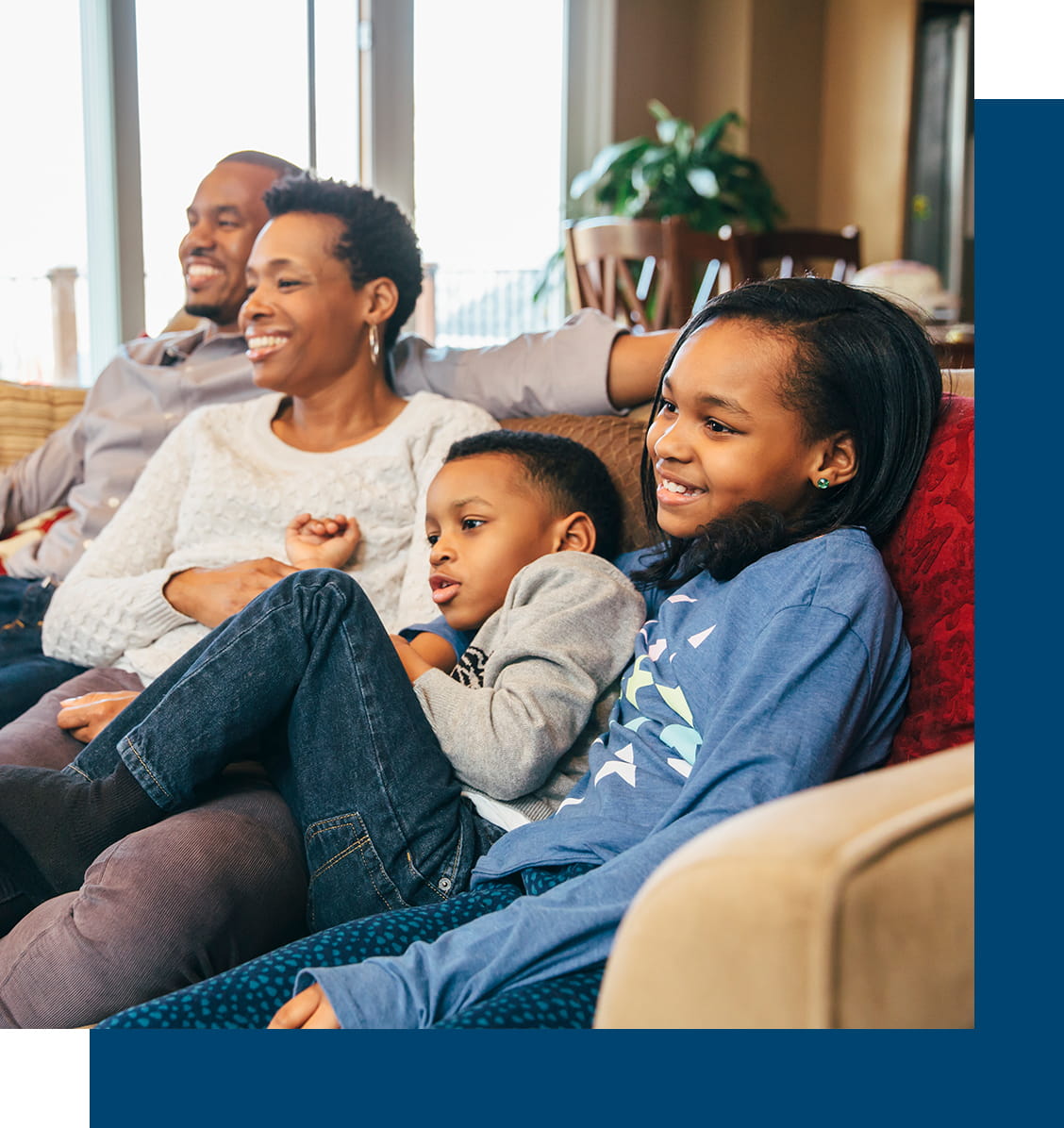 Happy family in living room together