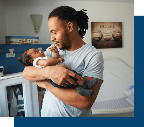 Father holding baby imagery