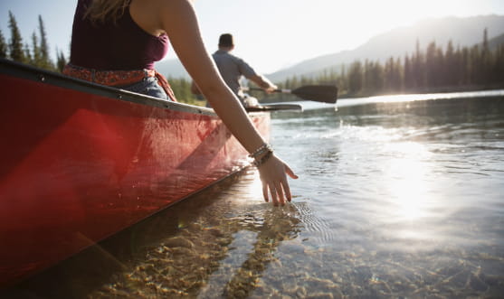 Couple Paddling Canoe