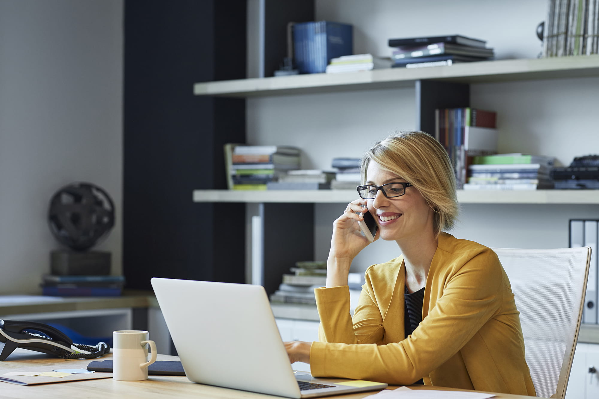 woman typing at computer